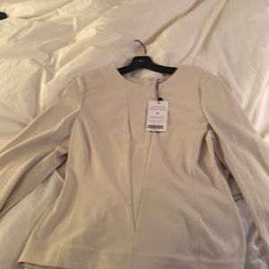 NWT, never worn, off white/cream peplum top - perfect for work!